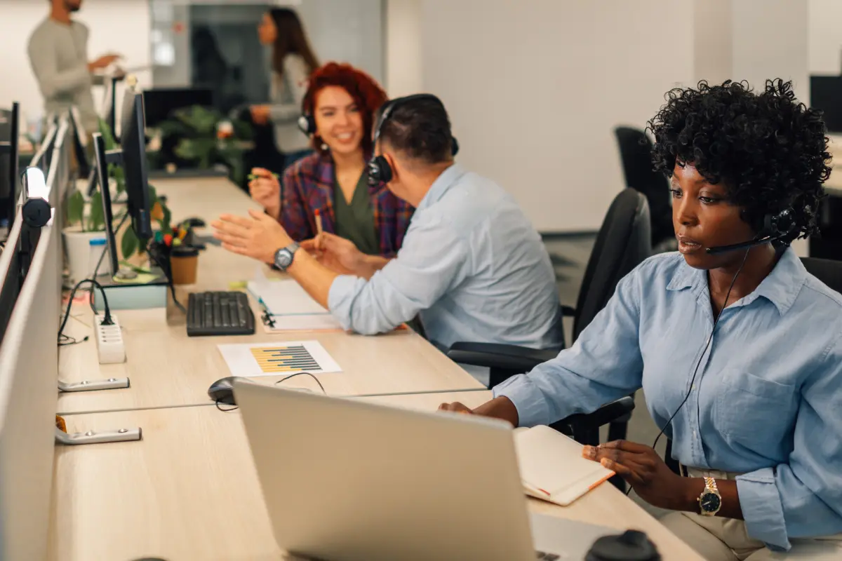 Team member working to help clients with it support issues